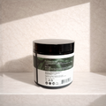 Jar with a label on a textured surface