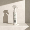 Nourish Vida leave-in conditioner bottle on a light background
