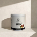 Jar of Nourish Vida Argan Oil + Protein Hair Milk on a neutral background